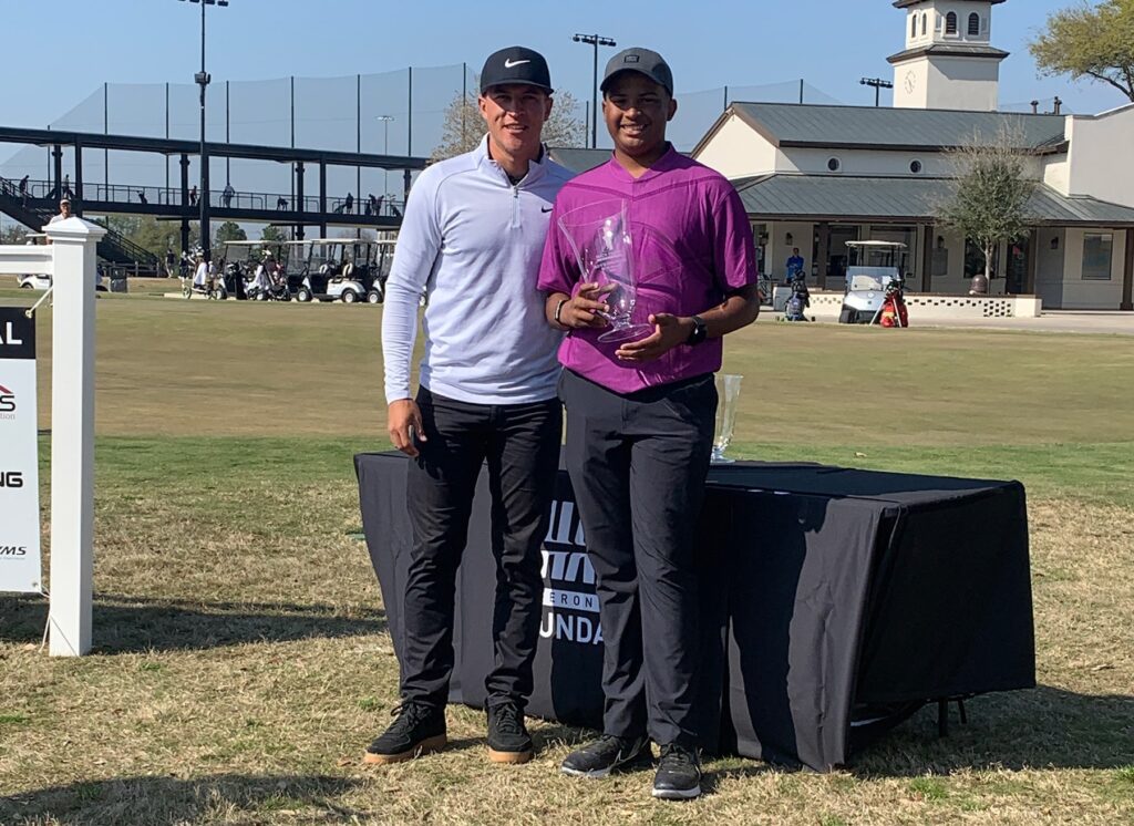 Cameron Champ with Roman Solomon, who won the boys 15- to 18-year-old division.