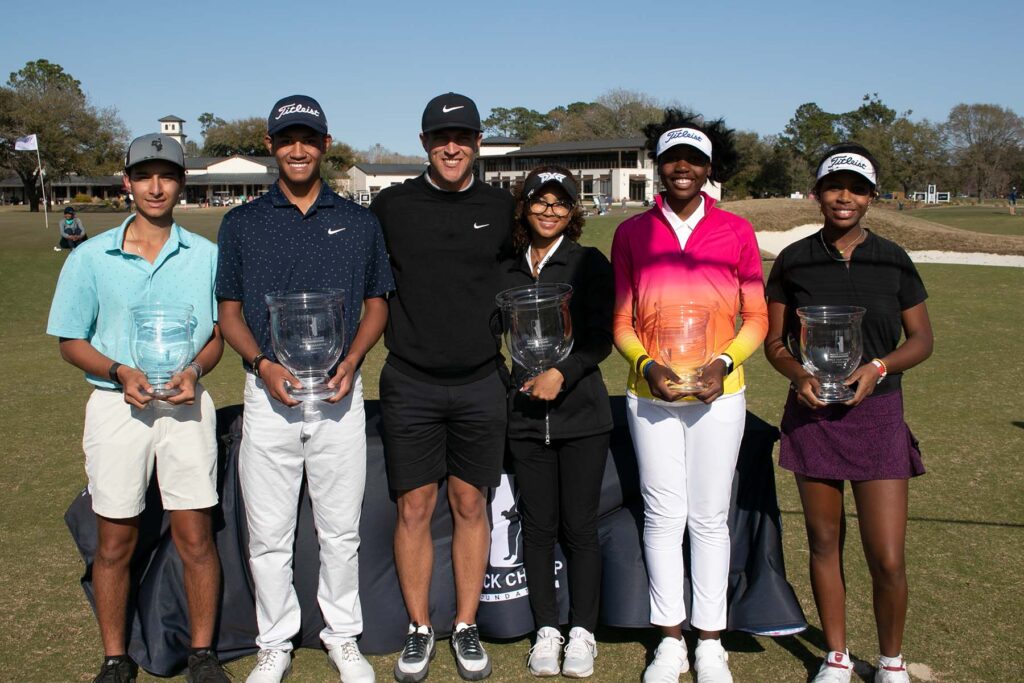 Cameron Champ with 2022 Mack Champ Invitational trophy winners 13-18 year old age group