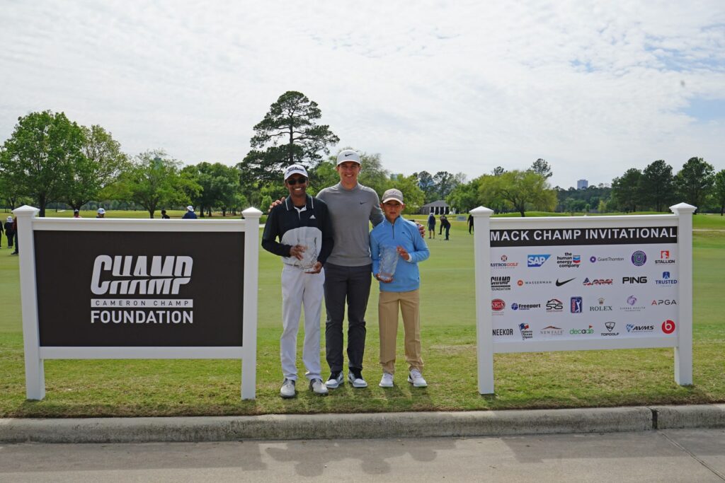 Shiv Parmar, Cameron Champ and Isaiah Diaz with foundation and sponsor signs