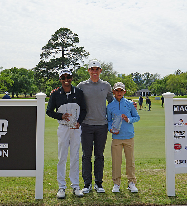Shiv Parmar, Cameron Champ and Isaiah Diaz with foundation and sponsor signs