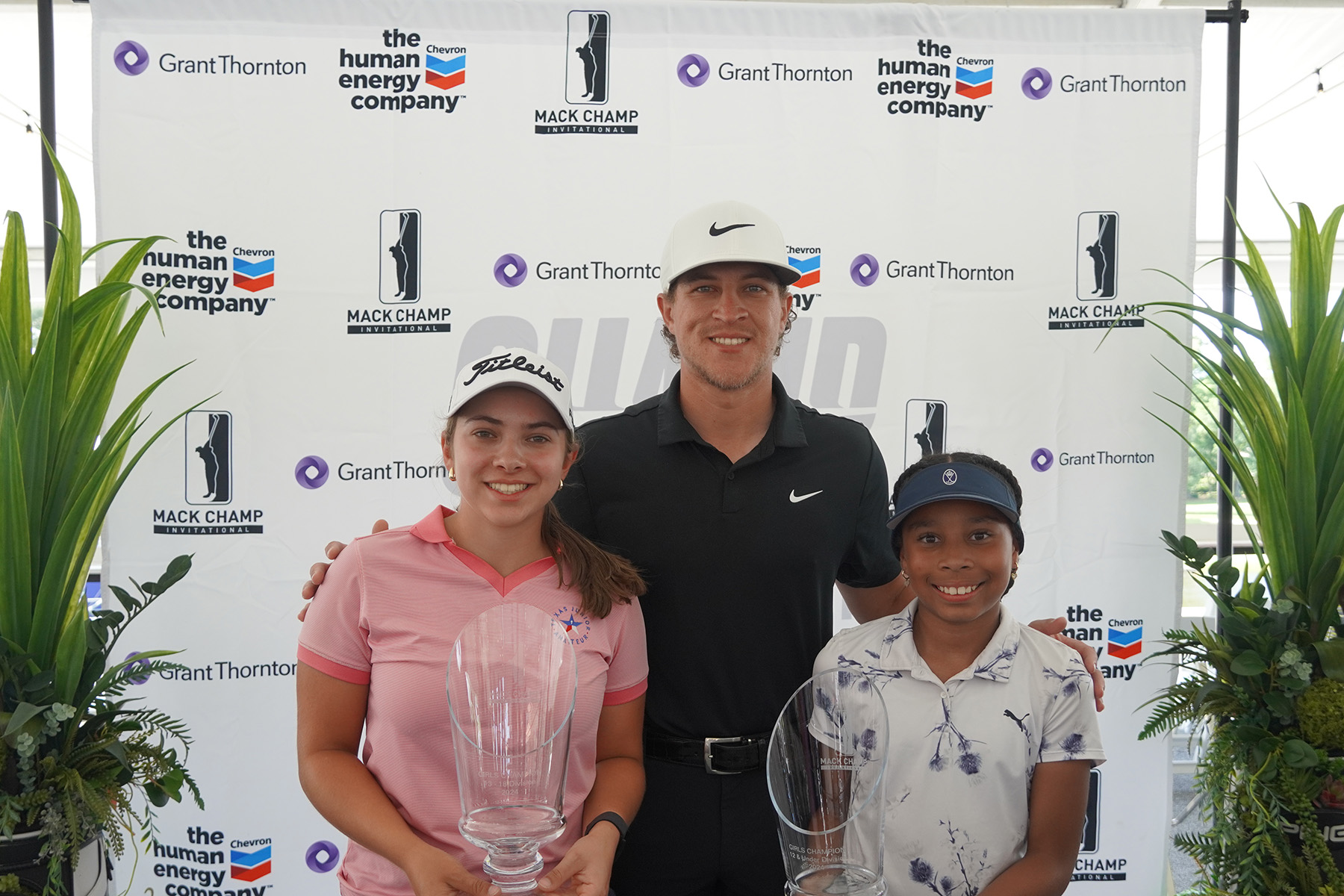 Lydia Portlock, Kayla Jackson and Cameron Champ with trophies in 2024